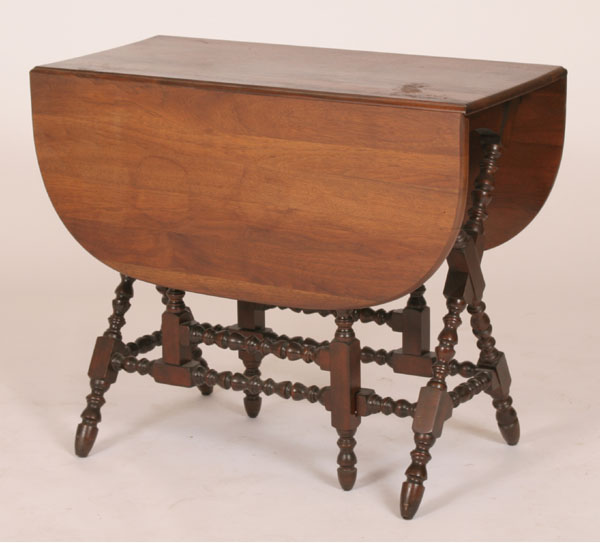 Mahogany butterfly drop leaf table;