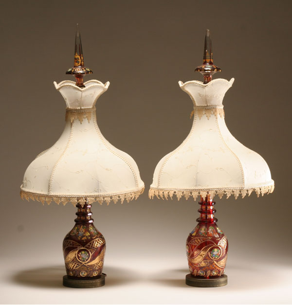Pair Bohemian flashed cut glass lamps;