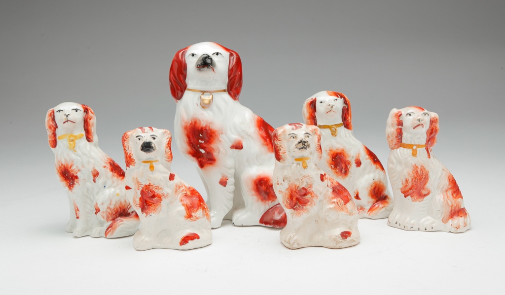 SIX ENGLISH STAFFORDSHIRE SPANIELS.