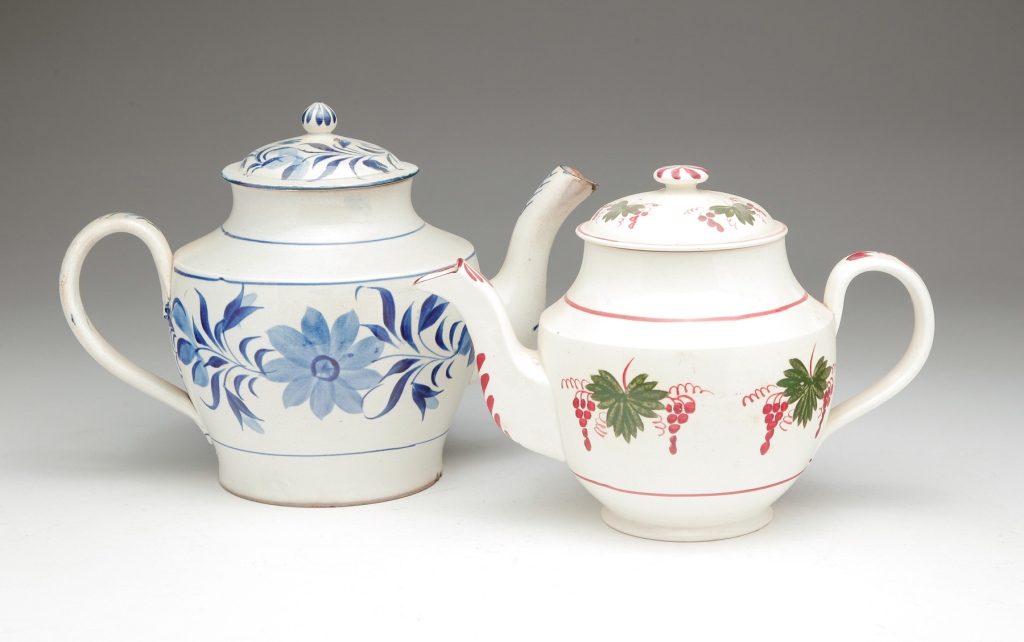 TWO ENGLISH EARTHENWARE TEAPOTS. First