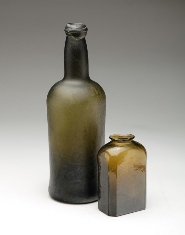 TWO ENGLISH OLIVE GREEN BOTTLES.