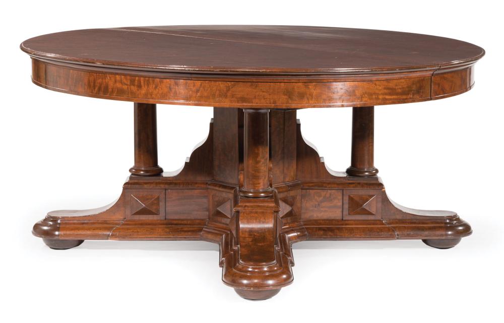 CARVED MAHOGANY EXTENSION DINING TABLEMonumental