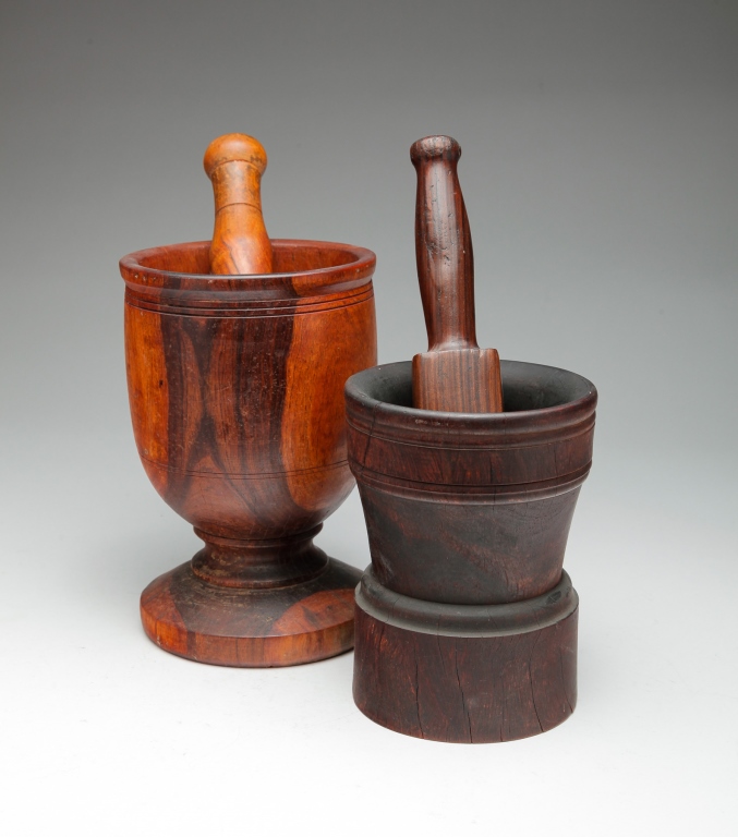 TWO EUROPEAN MORTAR AND PESTLES.