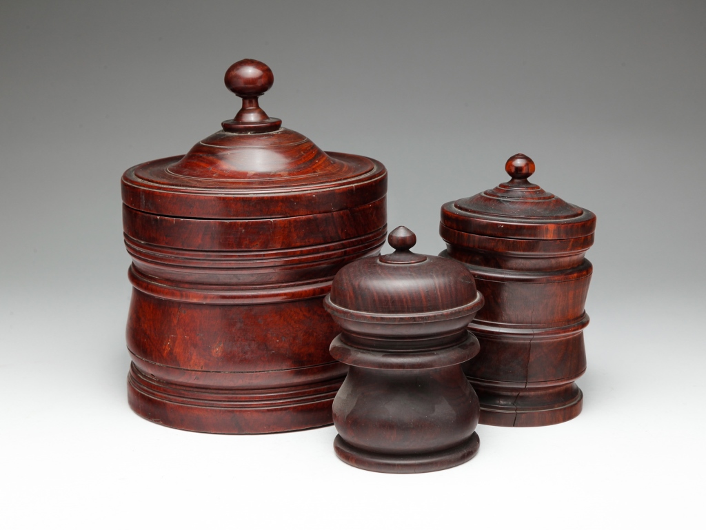 THREE LIGNUM VITAE TURNED JARS.