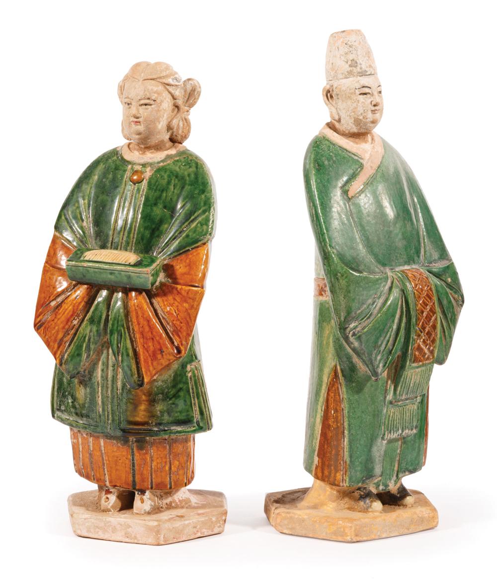 TWO CHINESE SANCAI GLAZED POTTERY ATTENDANTSTwo