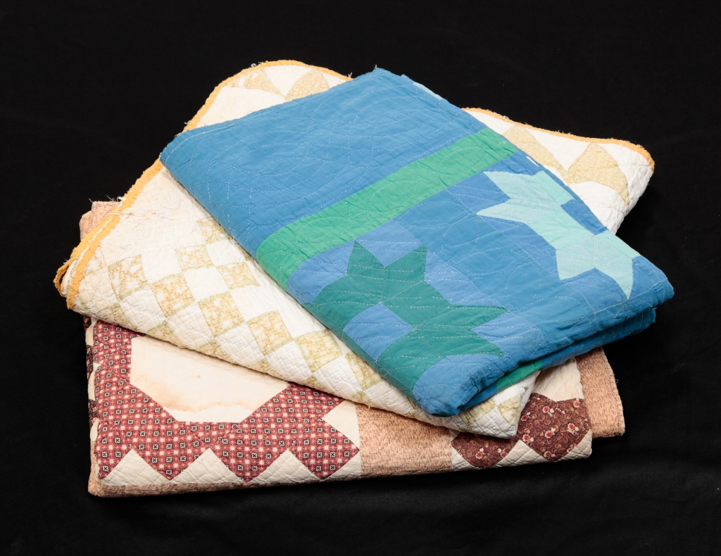 THREE AMERICAN PIECED QUILTS. Late