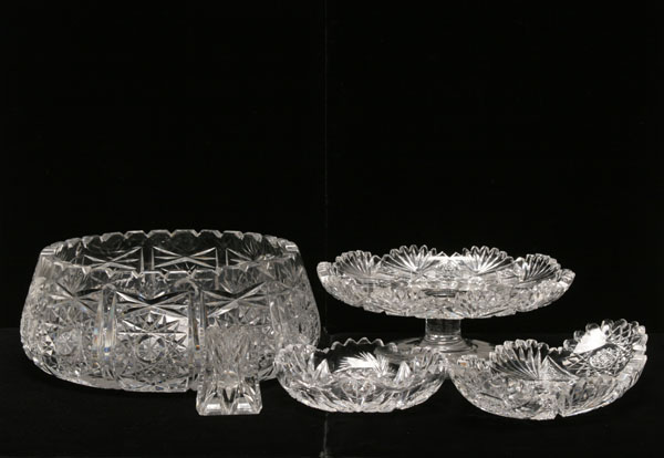 Cut glass items; large bowl, two smaller