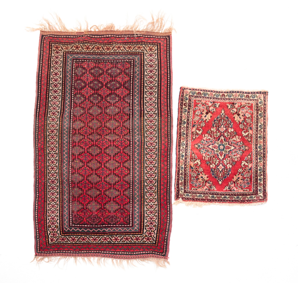 TWO ORIENTAL RUGS Twentieth century  319ed7