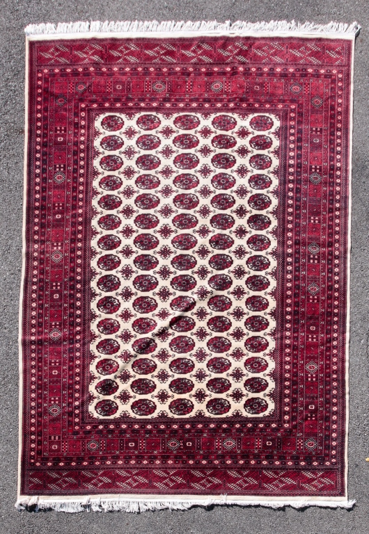 ROOMSIZE BOKHARA RUG. Hand knotted