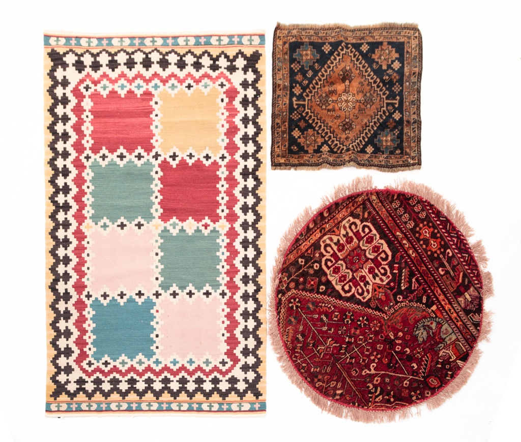 THREE ORIENTAL RUGS. Second half