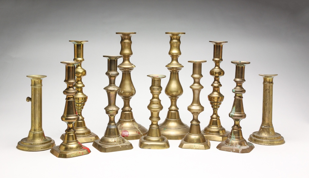 GROUP OF BRASS CANDLESTICKS. Mostly