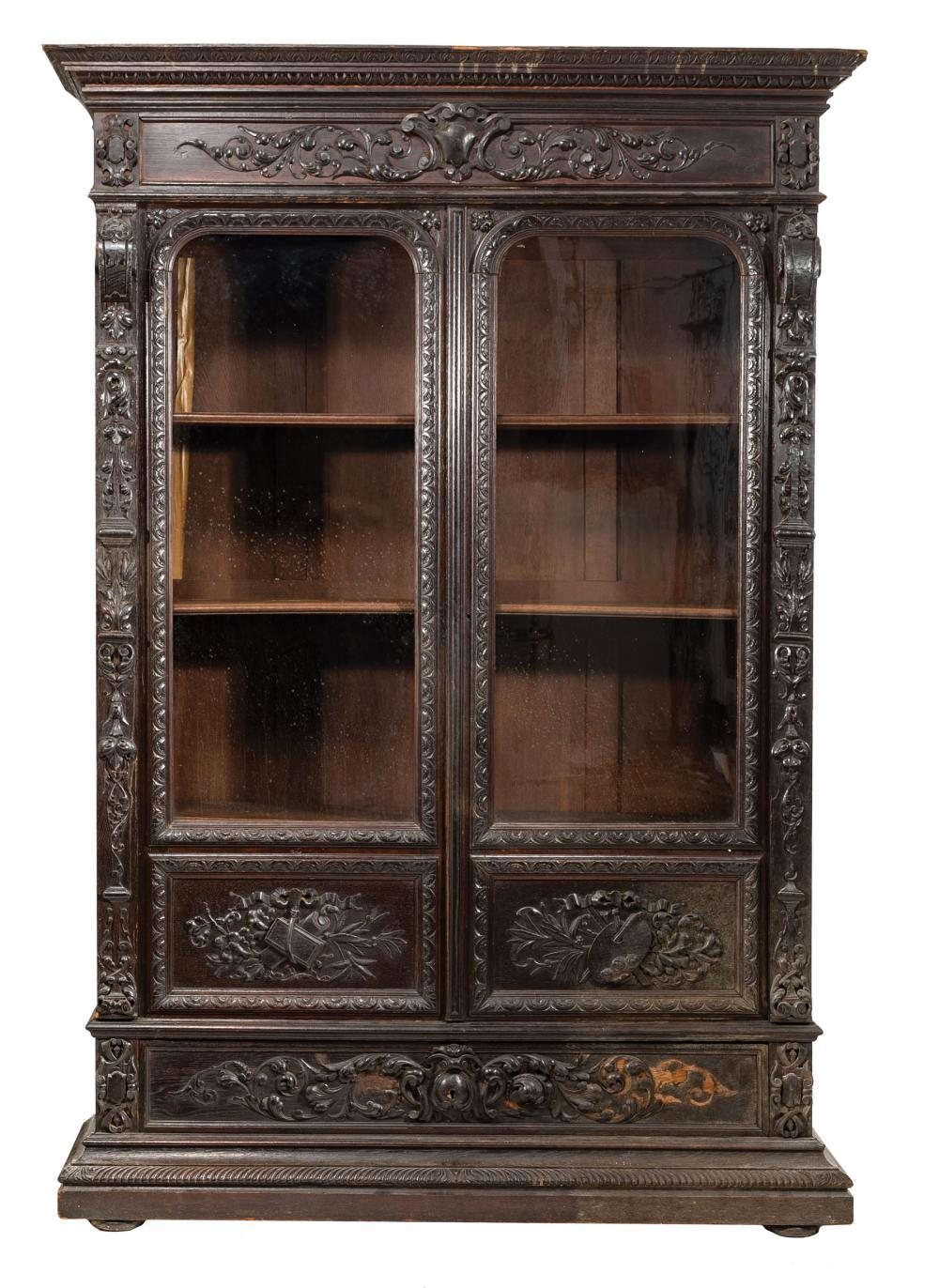 AMERICAN RENAISSANCE CARVED OAK CABINETAmerican