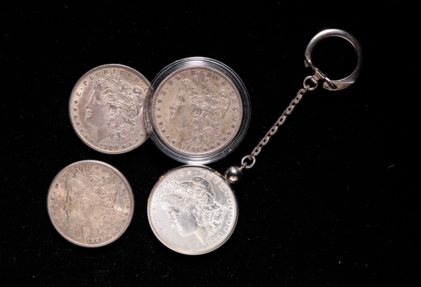 FOUR MORGAN SILVER DOLLARS Includes 31a25f