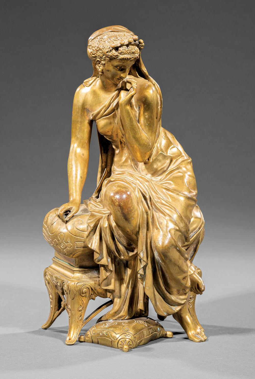 GILT BRONZE FIGURE OF A MAIDEN