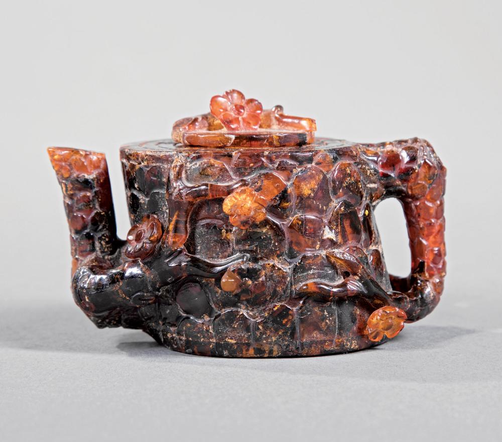 CHINESE CARVED AMBER COVERED TEAPOTChinese