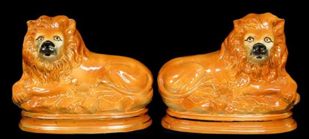 PAIR OF STAFFORDSHIRE RECLINING 31d4ee