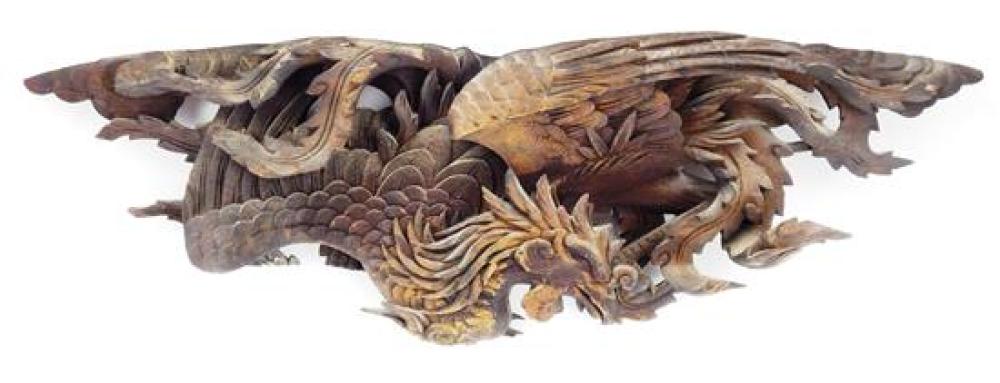 CARVED WOOD RELIEF OF A PHOENIX,