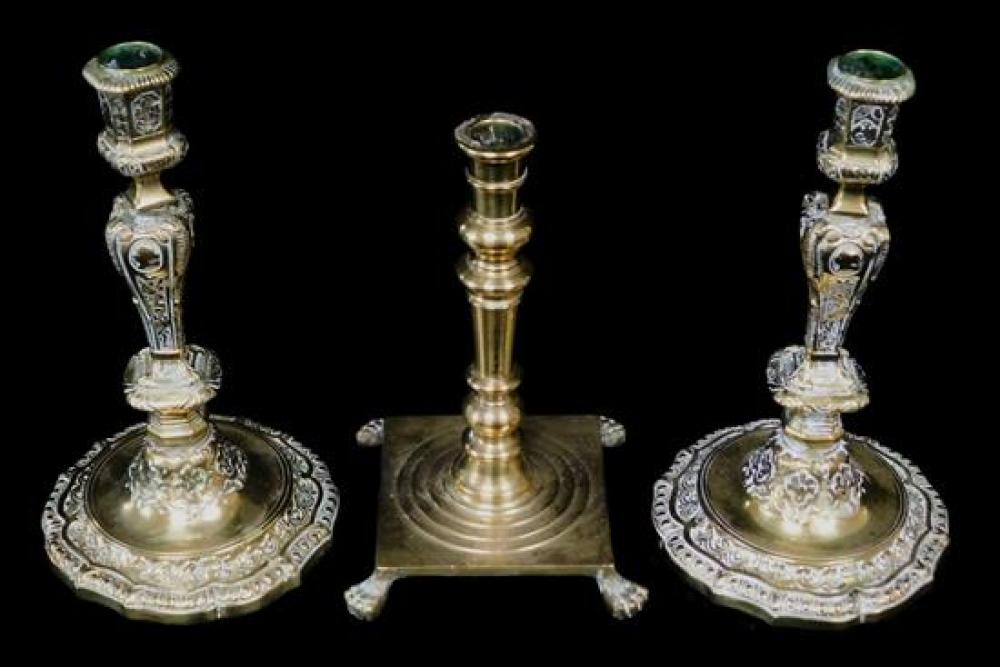 THREE EARLY BRASS CANDLE STICKS,