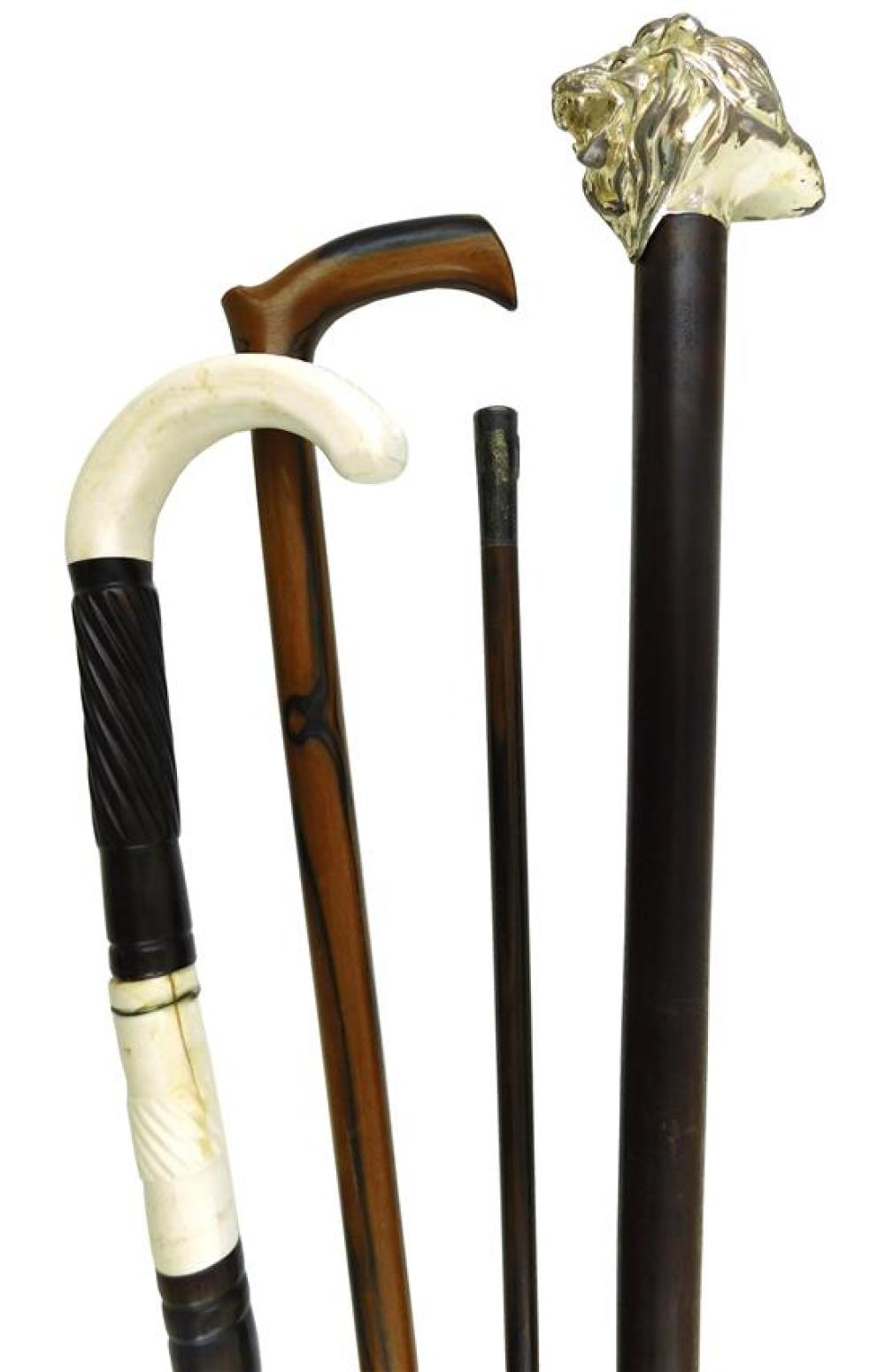 FOUR WALKING STICKS AND CANES: