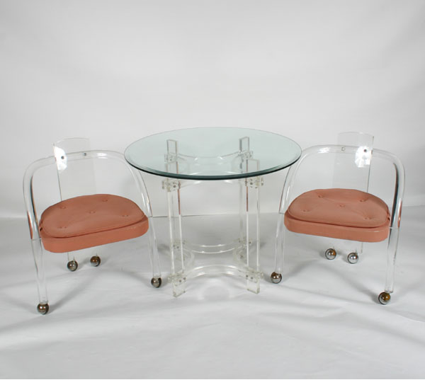 Modern design lucite table and chairs;