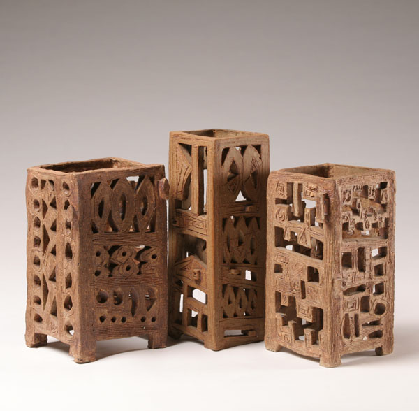 Lot of three ceramic towers, abstract