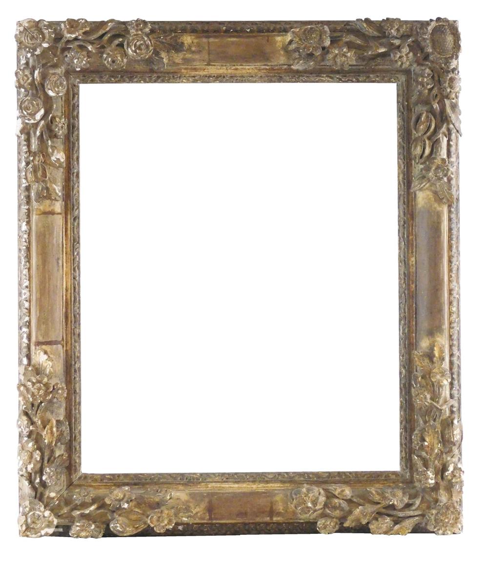 EARLY CARVED FRAME WITH ORNATE