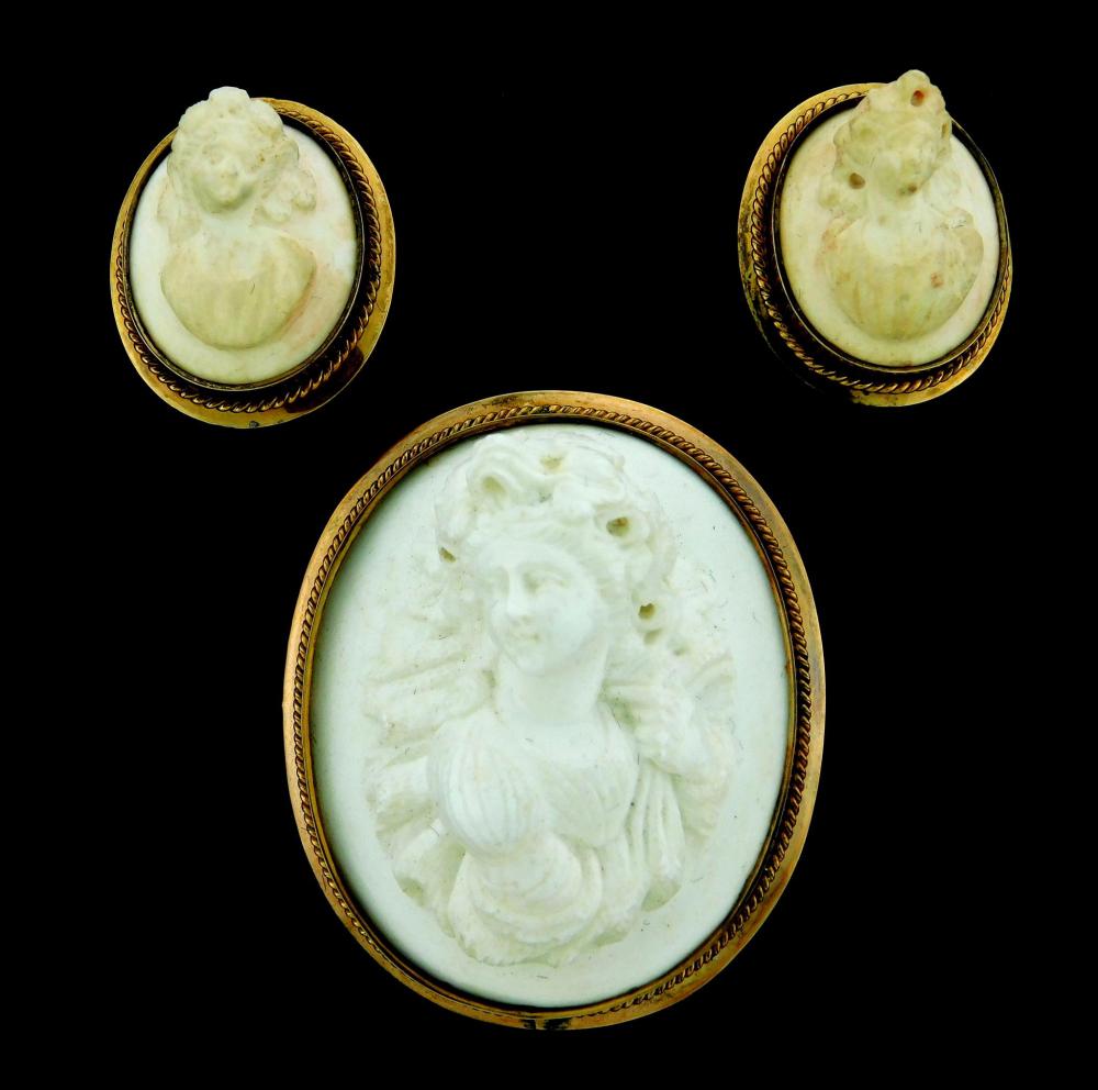 JEWELRY: THREE WHITE CORAL CAMEO