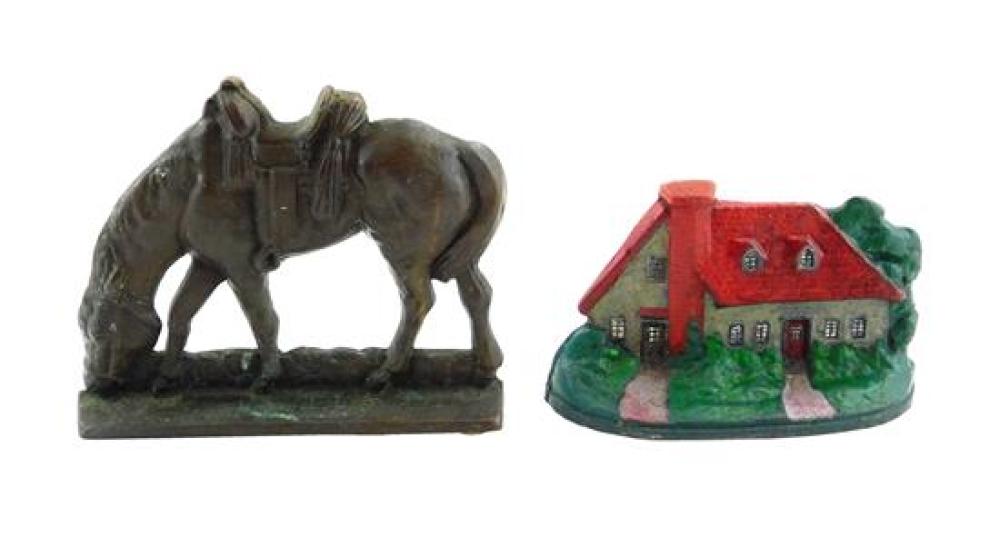 TWO CAST IRON DOORSTOPS, GRAZING HORSE