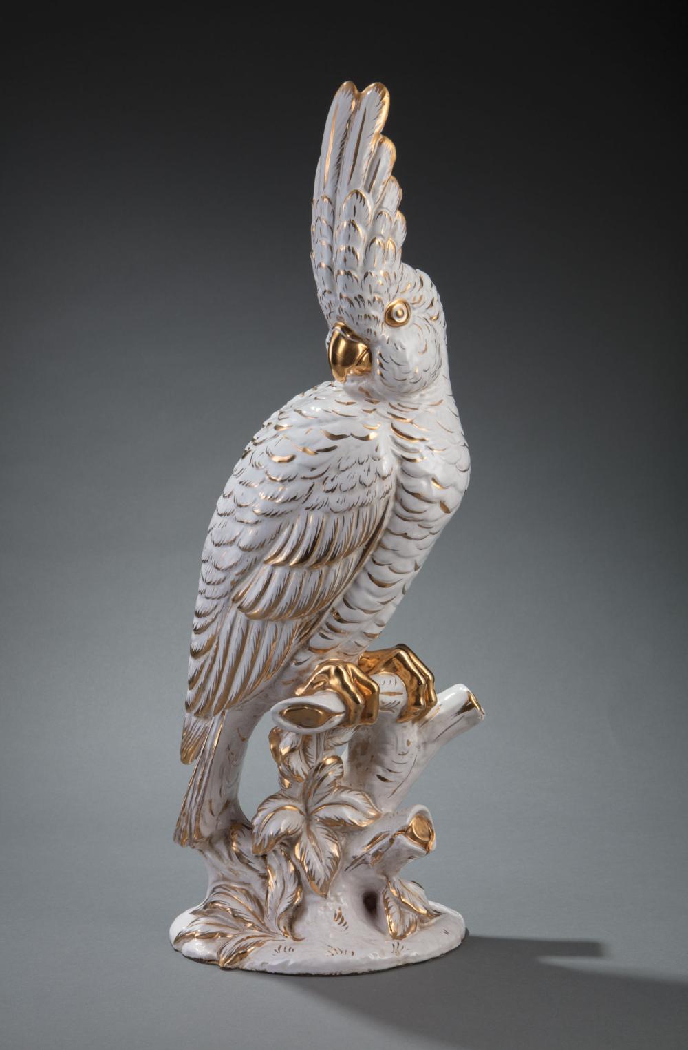 GILT-DECORATED WHITE GLAZED PERCHED