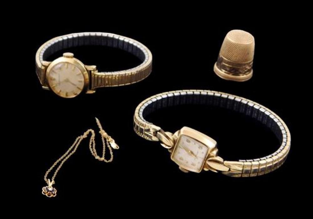 JEWELRY: FOUR YELLOW GOLD ACCESSORIES,