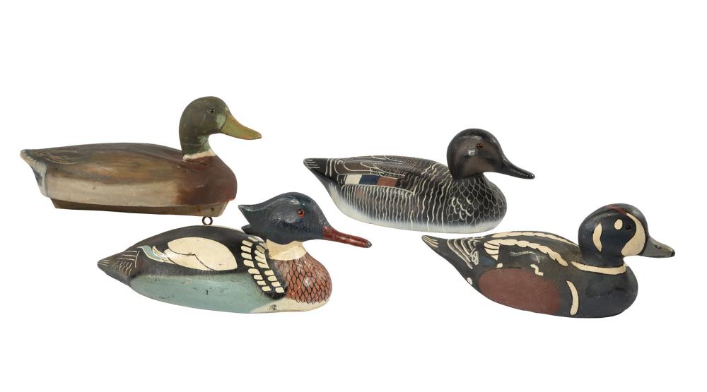 FOUR CARVED WOOD DUCK DECOYSFour 31c396