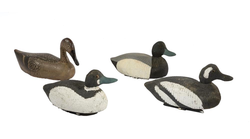 FOUR CARVED WOOD DUCK DECOYSFour 31c398