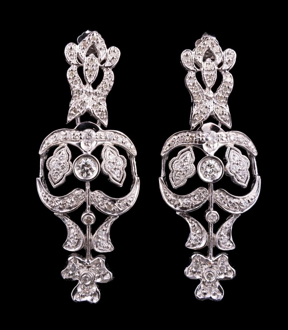 18 KT. WHITE GOLD AND DIAMOND DANGLE