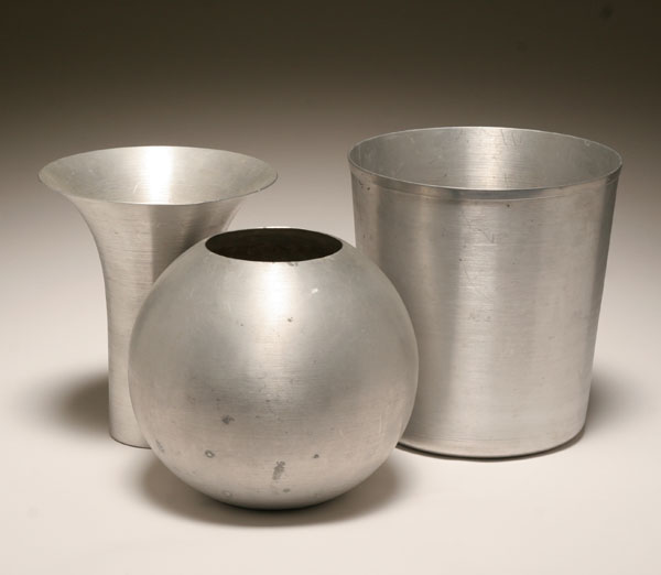 Three large spun aluminum pieces including