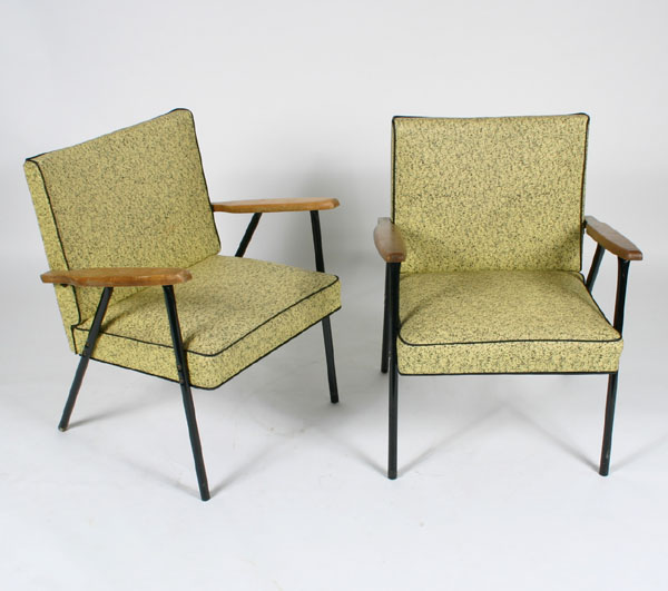 Pair of retro vinyl armchairs with wooden