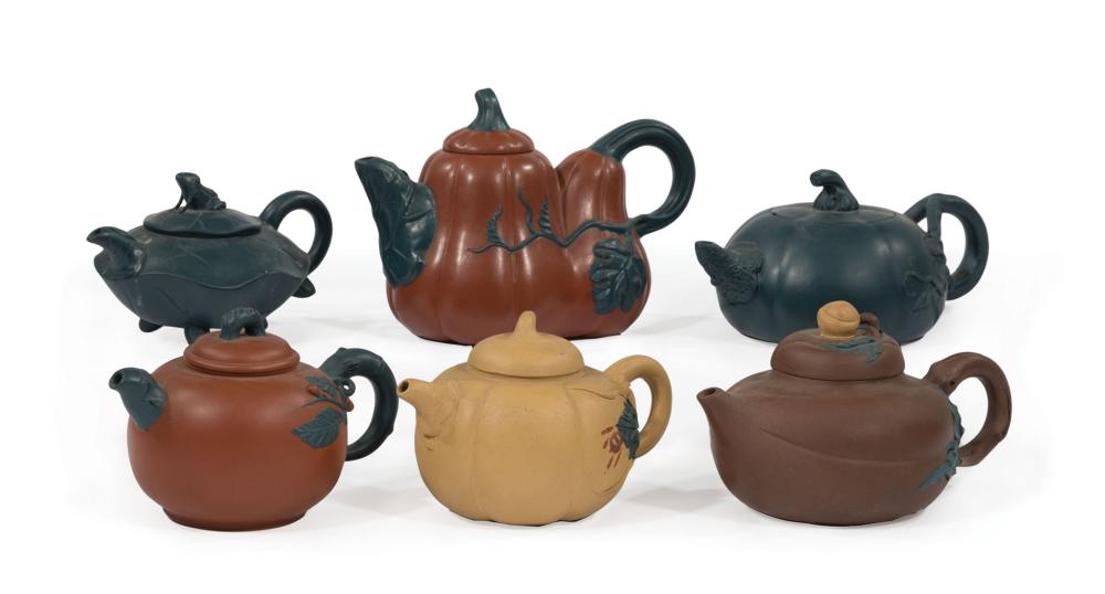 SIX CHINESE YIXING POTTERY TEAPOTSSix