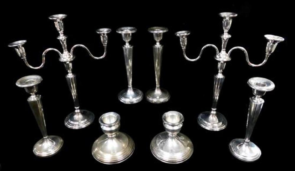 SILVER: FOUR PAIRS OF CANDLESTICKS,