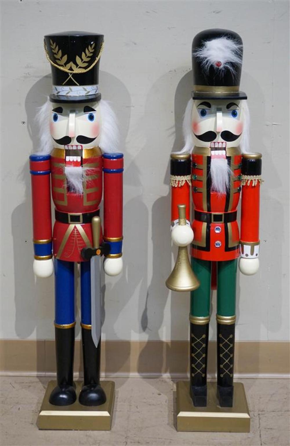 TWO DECORATED WOOD SOLDIER NUTCRACKERS  31f672