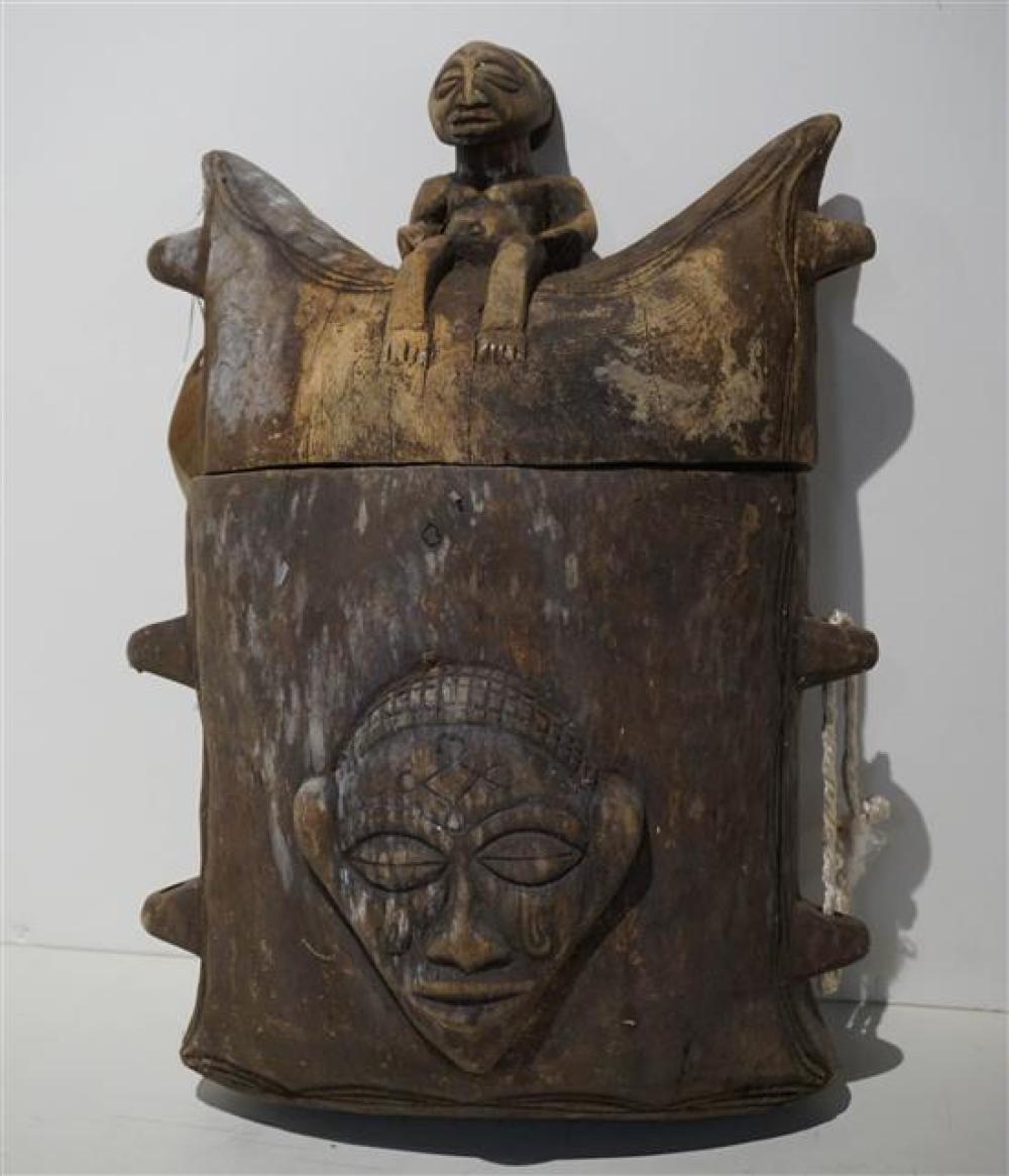 AFRICAN CARVED WOOD COVERED VESSELAfrican 31f740