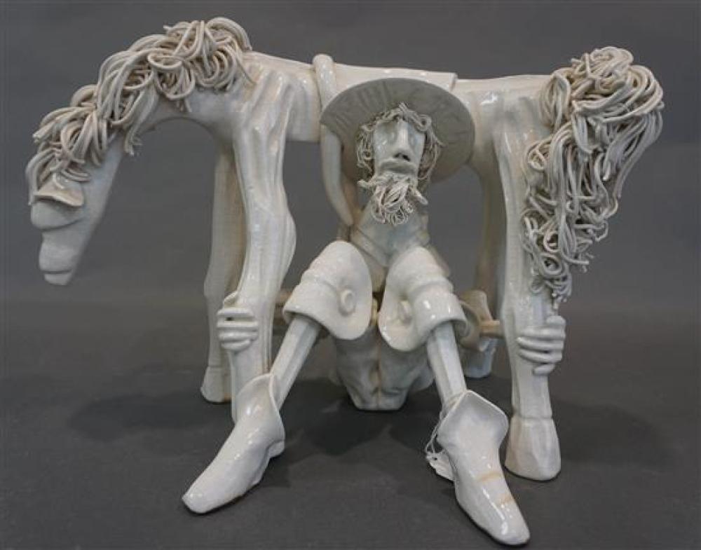 WHITE CERAMIC GROUP OF A SEATED