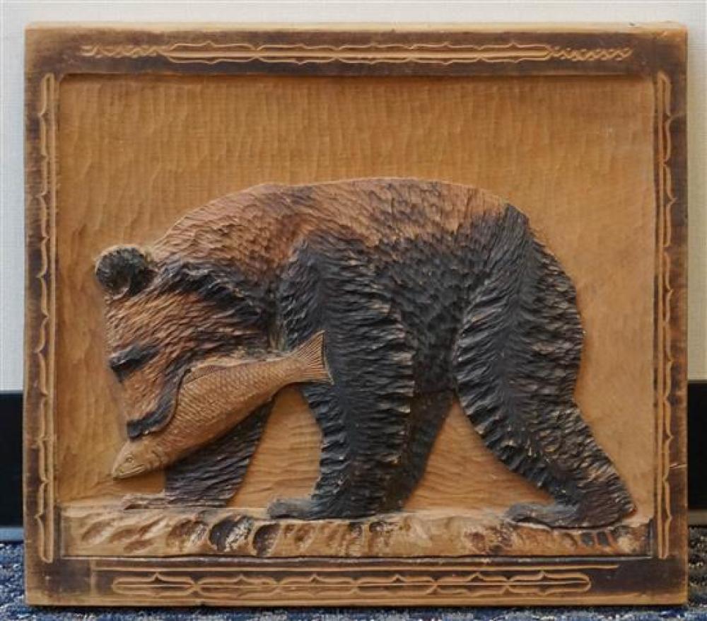 CARVED WOODEN PLAQUE OF A BEAR