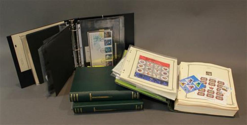 FOUR VOLUMES OF INTERNATIONAL STAMPS,