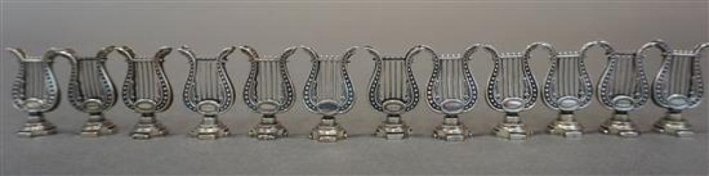 TWELVE ENGLISH SILVER 'LYRE' PLACECARD