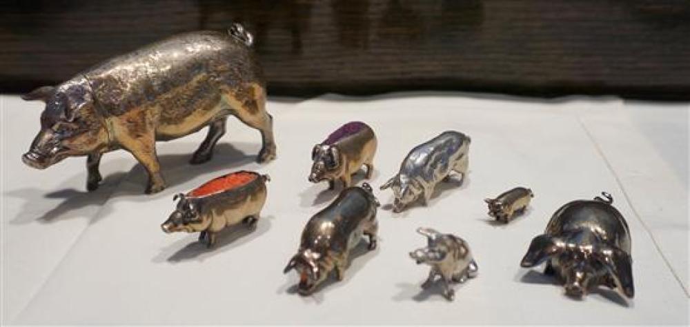 EIGHT ASSORTED SILVER AND OTHER PIG