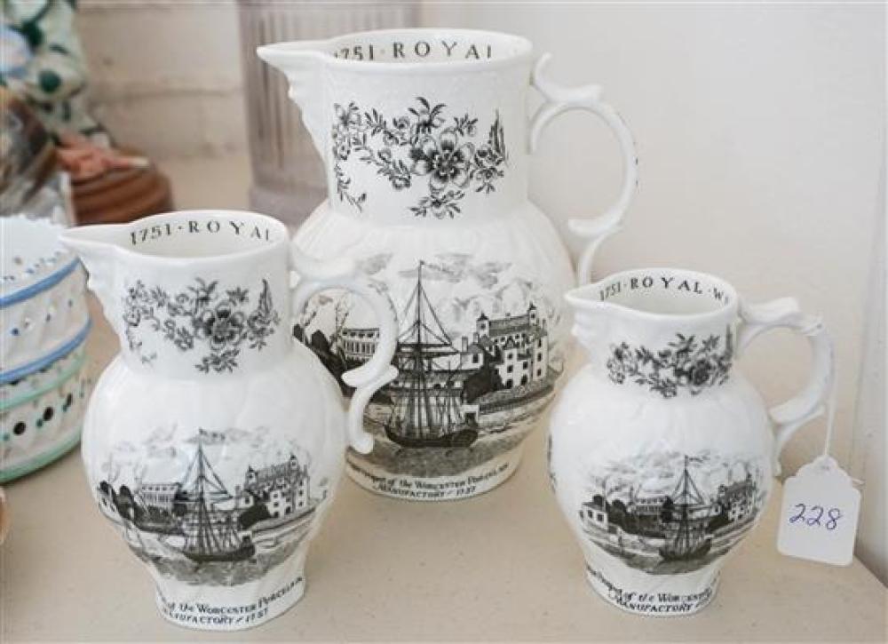 THREE GRADUATED ROYAL WORCESTER PITCHERSThree