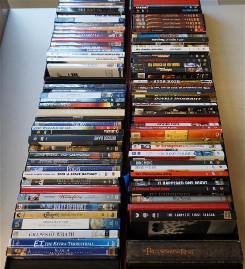 FOUR BOXES WITH APPROXIMATELY 100 DVDSFour