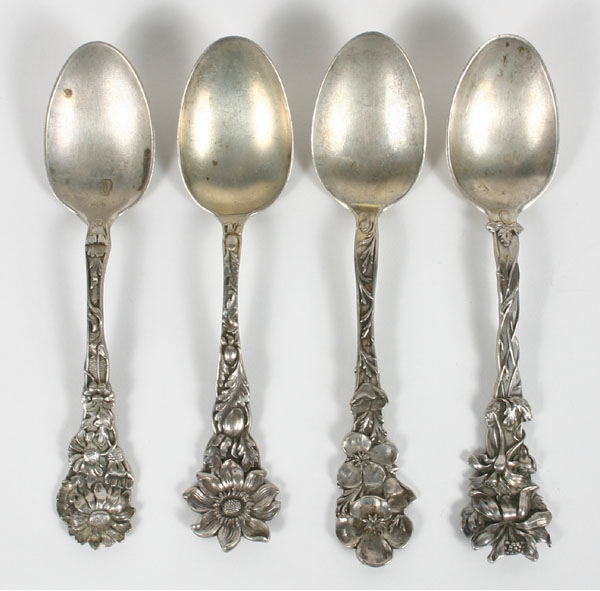 Lot of four Nouveau sterling spoons: