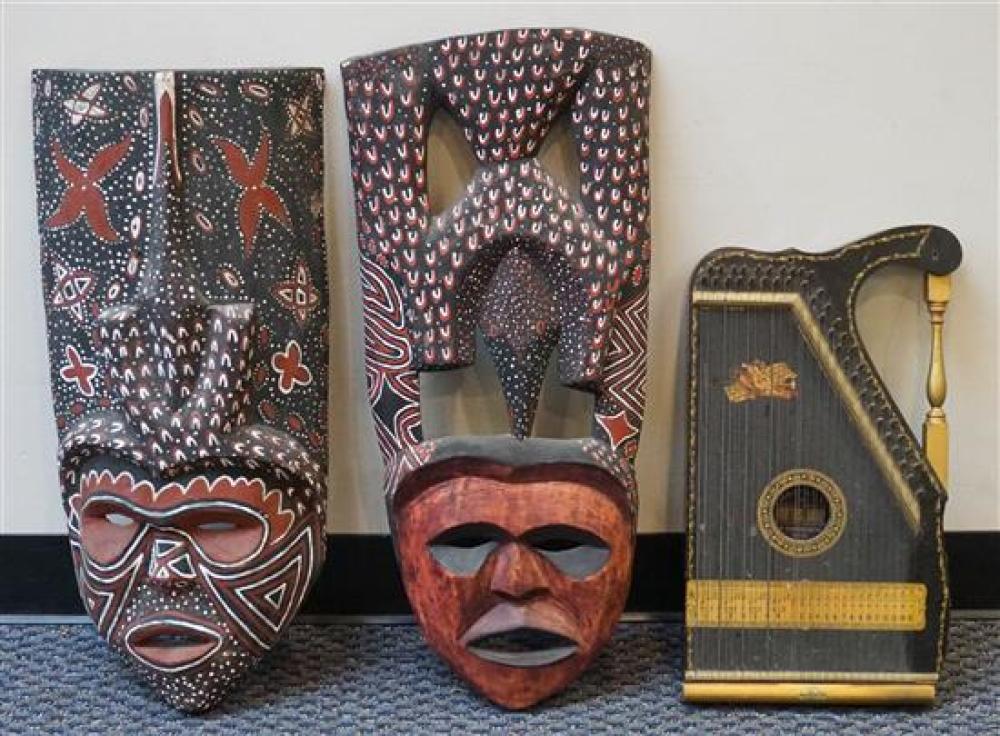 TWO DECORATED WOOD MASKS AND A 320898