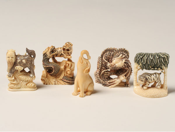 Japanese carved ivory netsukes;