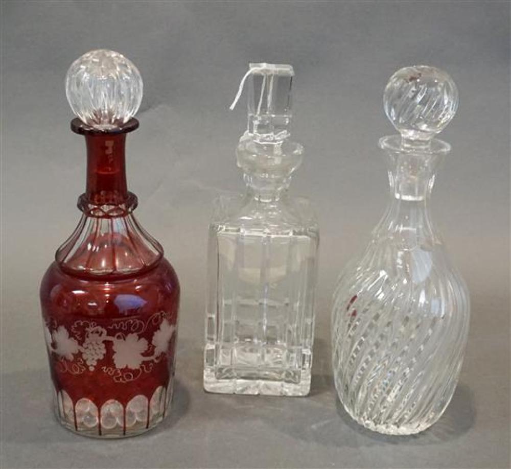 TWO CRYSTAL DECANTERS AND BOHEMIAN RUBY-TO-CLEAR